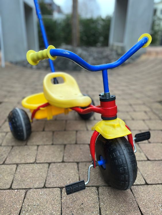 Dreirad mit Schubstange Tricycle avec barre de poussée Kaufen auf