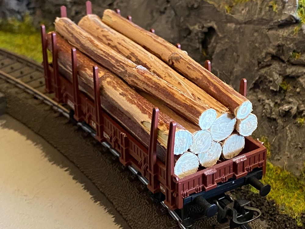 Märklin Rungenwagen 2 achsig mit Holzladung Acheter sur Ricardo