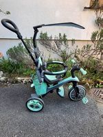 Tricycle avec manche de conduite 