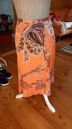 Rock orange gemustert Grösse 42 guter Zustand
