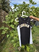 Maillot Jordan noir taille L enfant/147-163