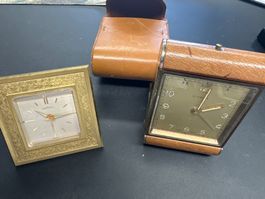 2 versch. Wecker 1x Angelus vergoldet, 1x Cyma mit Hülle