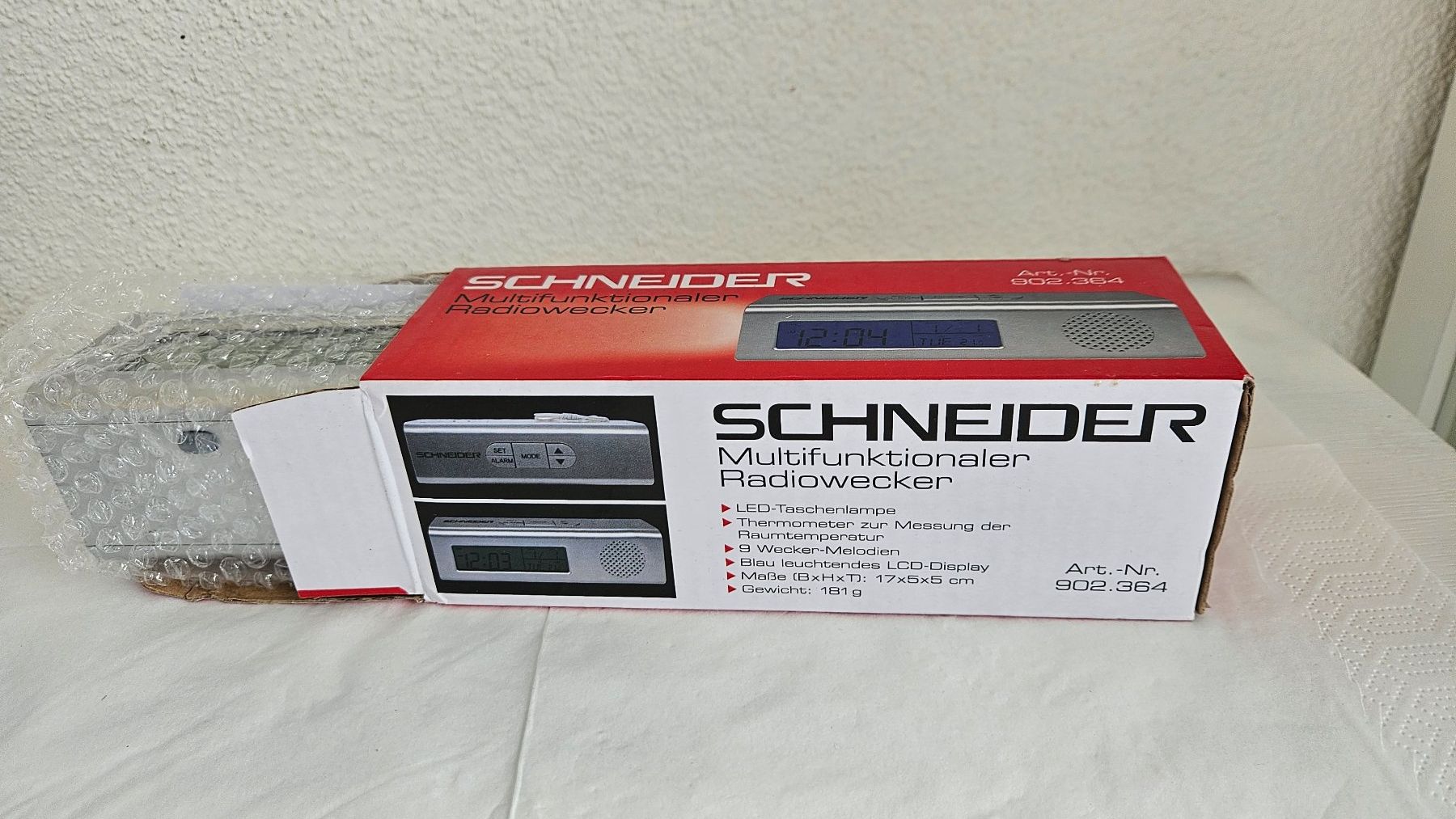 Sveglie: Schneider Radiowecker, neu, multifunktional, silber – Nuovo e nell'imballaggio originale da Gossau ZH venduto da Goes05