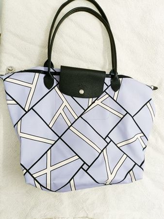 Neue Longchamp Tasche mit raffiniertem Muster
