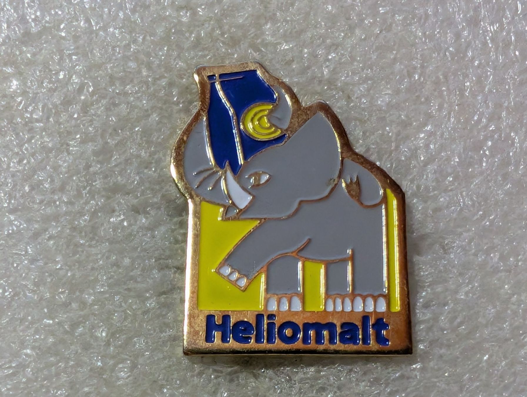 Placchette & Badge: Ansteckpin 2: Heliomalt – Usato da Oppligen venduto da Pin-Fall-Shop