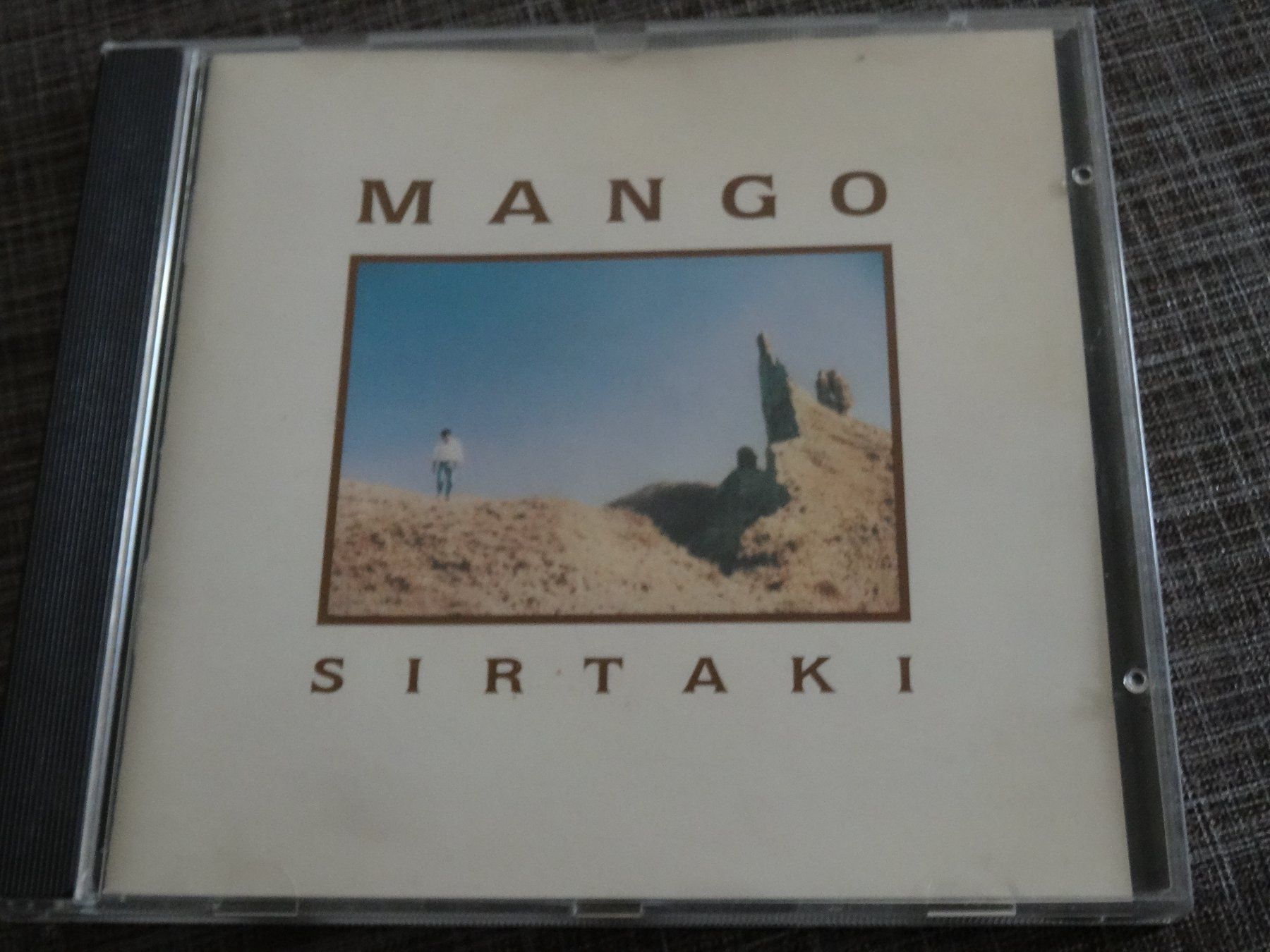 CDs: Mango - Sirtaki CD – Gebraucht aus Olten von Disc-Ausverkauf
