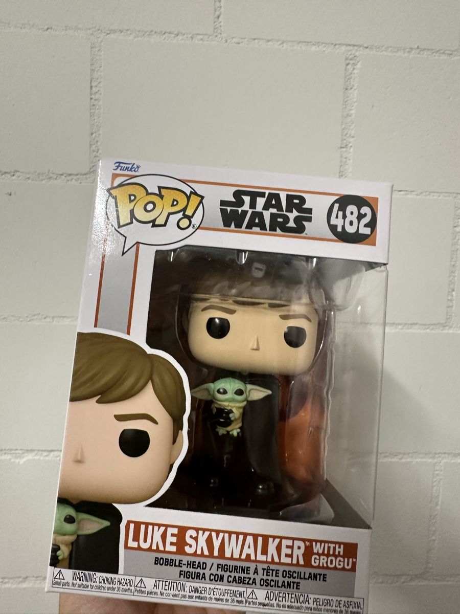 Star Wars Figuren: POP Star Wars Luke Skywalker mit Grogu Figur – Neu und originalverpackt aus Niederuzwil von Ib-top