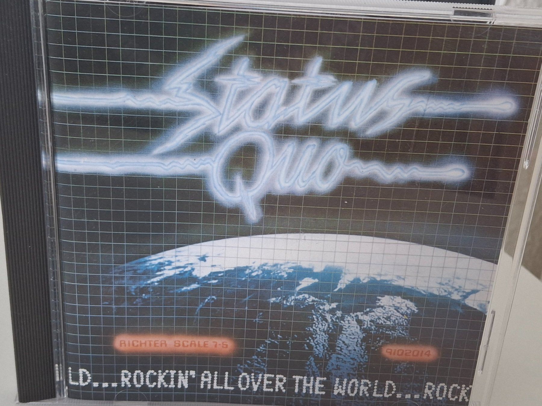 CDs: CD Status Quo  -  Rockin' All Over The World – Gebraucht aus Aarberg von Jackup1