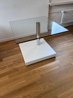 Couchtisch Glasplatte weisser Sockel Metallfuss eckig