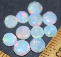 Mineralien Set L-7101 – 11 Stück äthiopische Opal Rondellen