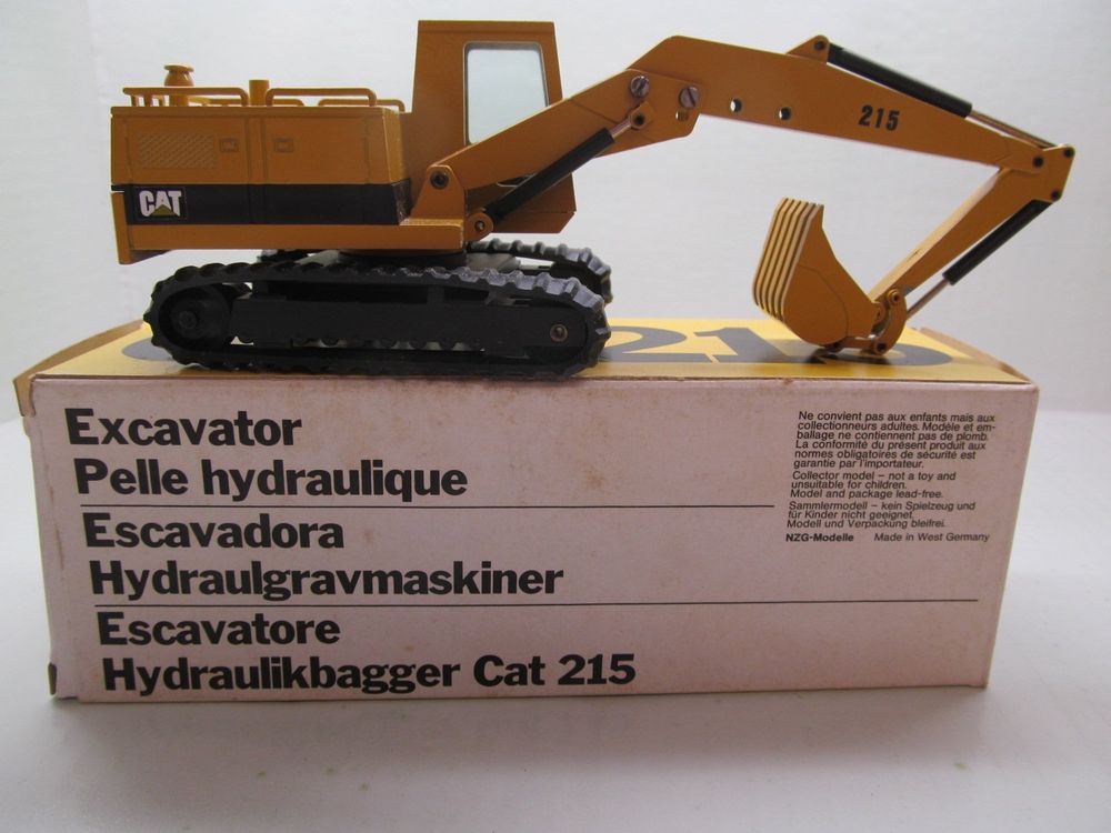 Pelle Caterpillar 215 NZG 1/50 - Jaune - Occasion - Réf 190