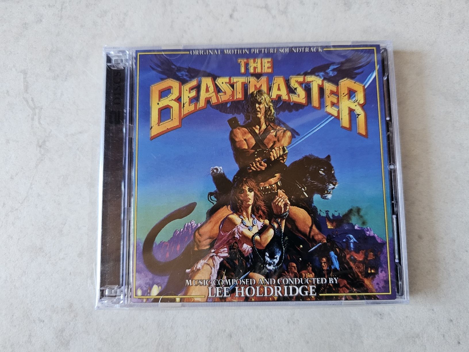 CD: The Beastmaster  -  Lee Holdridge / 2 CD Fabrikneu – Nuovo e nell'imballaggio originale da Schneisingen venduto da backstore24