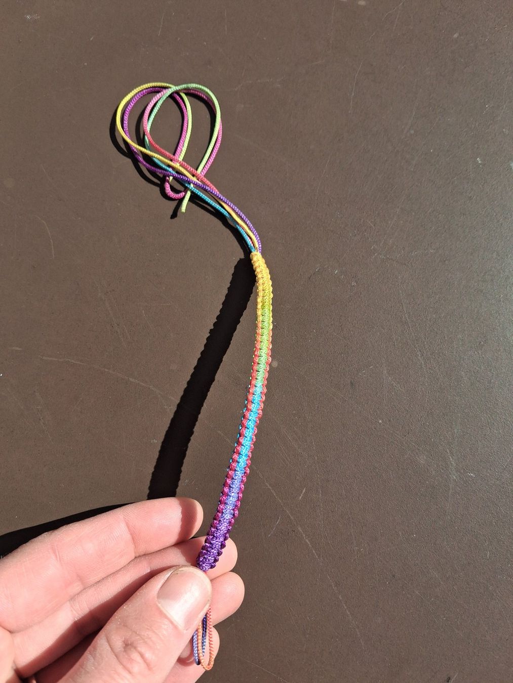 Bracciali & Braccialetti: Stoffarmband Regenbogenfarben, Neu! – Nuovo e nell'imballaggio originale da Wald ZH venduto da e8e 1