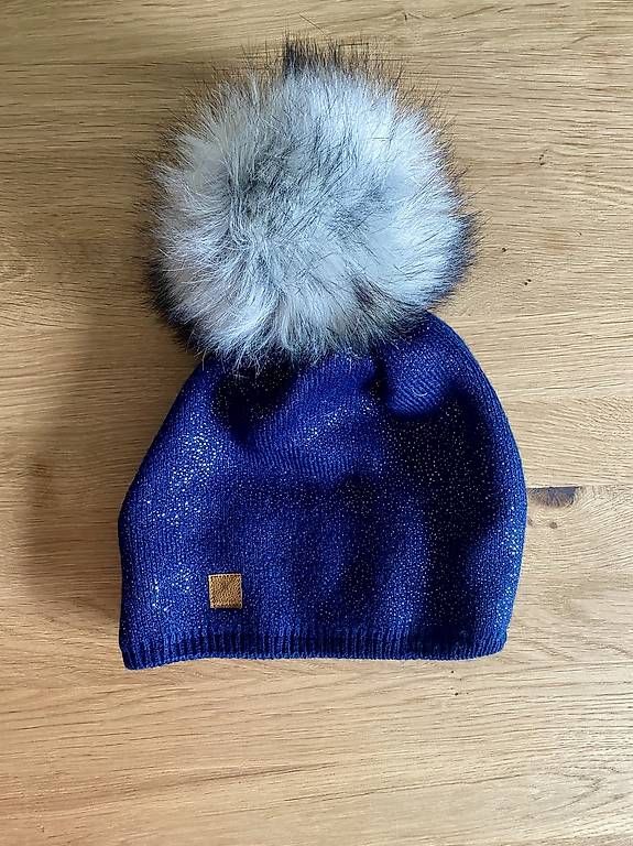 Copricapi, berretti & cappellini: Wintermütze blau mit Glitzereffekt und Bommel – Usato da Feuerthalen venduto da Sa1996