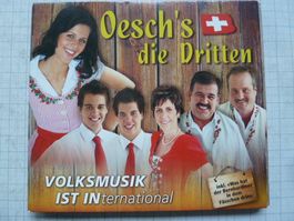 Oesch's die Dritten - Volksmusik ist International (visiert)