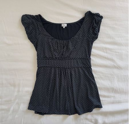 Black and white polka dot babydoll top