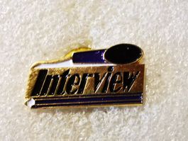 Ansteckpin 74: Interview