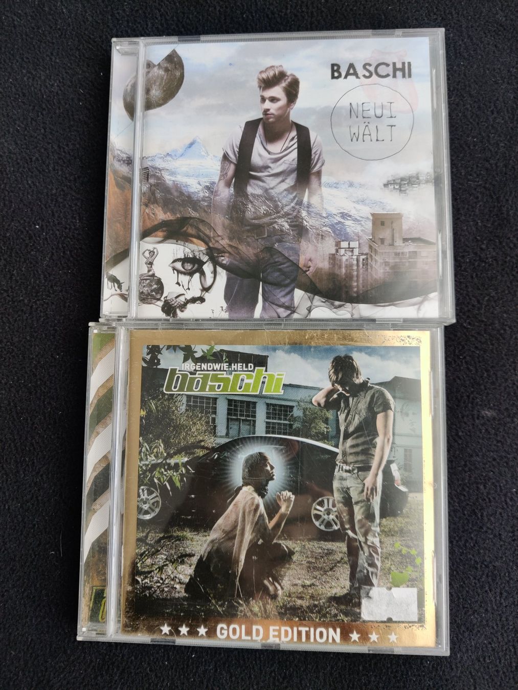 CD: 2 CD -  Baschi (Neui Wält / Irgendwie.Held) – Usato da Muttenz venduto da IkaSul