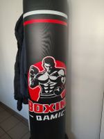 Sacco da boxe gonfiabile con guantoni 