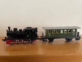 Modelleisenbahn "Märklin" 1 Lokomotive und 1 Wagen