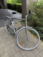 Vintage Silver City Bike, Perfect for Spring Commutes