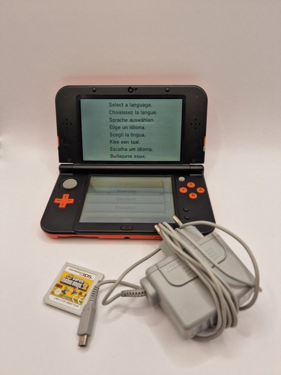 New Nintendo 3DS XL Orange, mit Super Mario Bros 2 Kaufen auf Ricardo