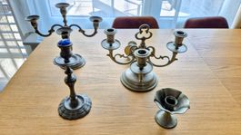 4 bougeoirs et candélabres anciens en étain. Prix à discuter
