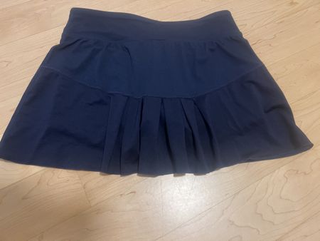 Sportrock New Balance blau mit Innenshorts Grösse S