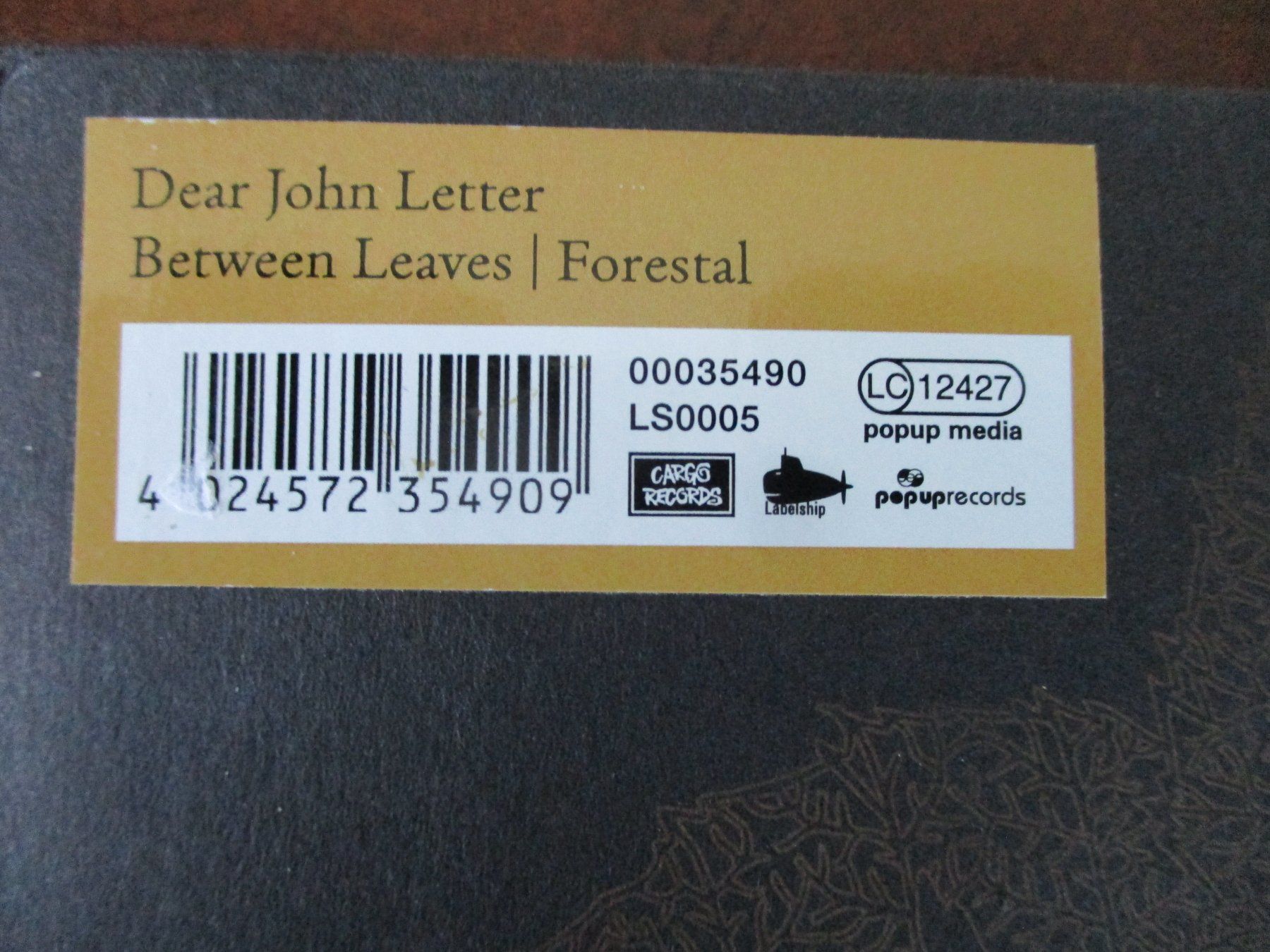 CD: Dear John Letter  -  Between Leaves/Forestal – Usato da Liestal venduto da Disc-Point 2