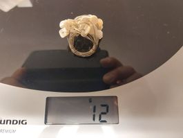 Metal ring + ( Pearls or shell splinters ?) Frs 1