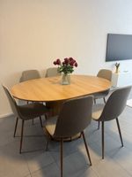 Table ronde extensible en bois avec rangement intégré