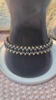 Bracciale pietra naturale ematite e perle dorate
