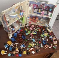 Maison Playmobil avec figurines et accessoires