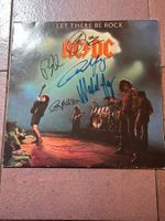 Signierte LP von AC/DC von allen signiert