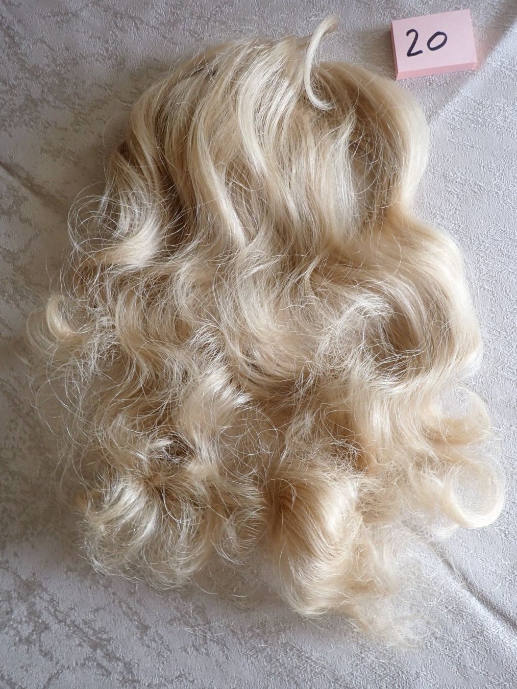 Parrucche: Haarteil blond – Usato da Herisau venduto da Steinwees