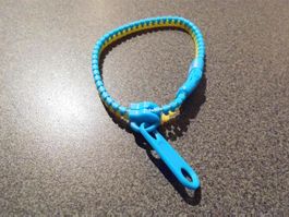 Armband Reissver. hellblau/gelb (Nr.1)