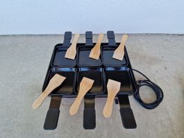 Racletteofen mit Grillplatte und 6 Pfännchen guter Zustand
