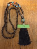 Vintage Kette Holzperlen mit Quaste und Schmuckelementen..