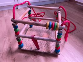 Kinder/Babyschaukel aus Holz mit bunten Perlen