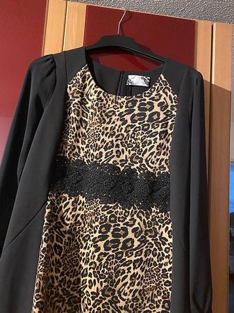Neues Kleid  in 46 mit  Etikette !