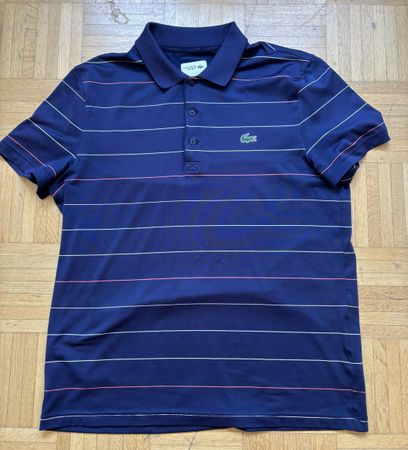 Polo Lacoste taille L , comme neuf
