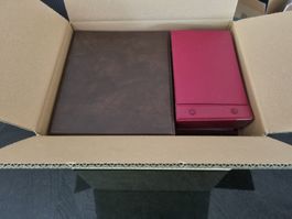Kiste mit xxx Schweizer FDC Ausgaben in 7 Alben