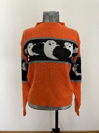 Pull orange avec motif fantômes noir et blanc T M