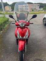 Roller Honda SH 125 mit Topcase