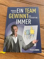 Buch “Ein Team gewinnt immer”