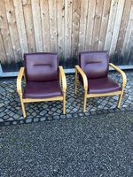 2 hochwertige Sessel in Leder und Holz