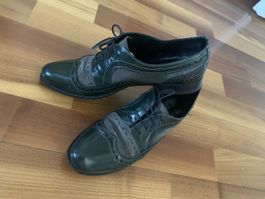 Green leather shoes