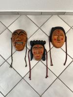Drei handgeschnitzte traditionelle Holzmasken aus Korea