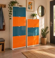 2 farbenfrohe Germania-Schuhschränke in Orange und Petrol