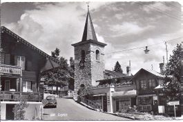 LEYSIN, intérieur du village avec église et magasin
